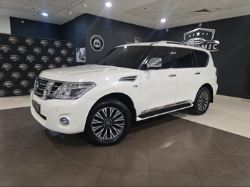Nissan  Patrol  Platinum  2014  Automatic  176,942 Km  8 Cylinder  Four Wheel Drive (4WD)  SUV  White