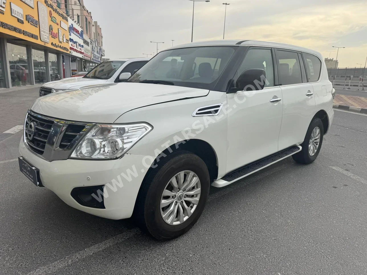 Nissan  Patrol  XE  2019  Automatic  195,000 Km  6 Cylinder  Four Wheel Drive (4WD)  SUV  White