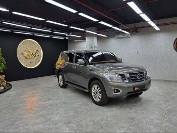 Nissan  Patrol  SE  2014  Automatic  290,000 Km  6 Cylinder  Four Wheel Drive (4WD)  SUV  Gray