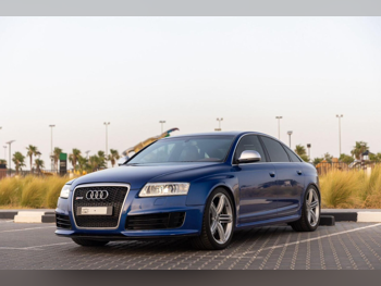 اودي  أر أس  6  2009  اوتوماتيك  90,000 كم  10 سلندر  دفع خلفي  سيدان  ازرق