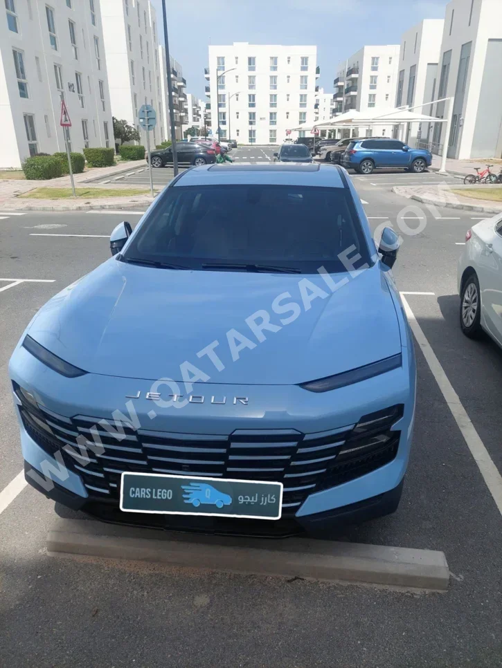 Jetour  Dashing  Luxury  2024  Automatic  33,000 Km  4 Cylinder  Front Wheel Drive (FWD)  SUV  Blue  With Warranty