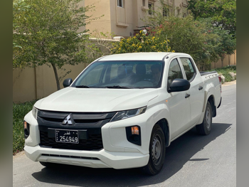 ميتسوبيشي  ال 200  2021  عادي  189,000 كم  4 سلندر  دفع خلفي  بيكب  أبيض