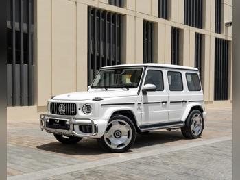 مرسيدس - بنز  جي - كلاس  63 اي ام جي  2025  اوتوماتيك  20,000 كم  8 سلندر  دفع رباعي  اس يو في  أبيض  تحت الضمان