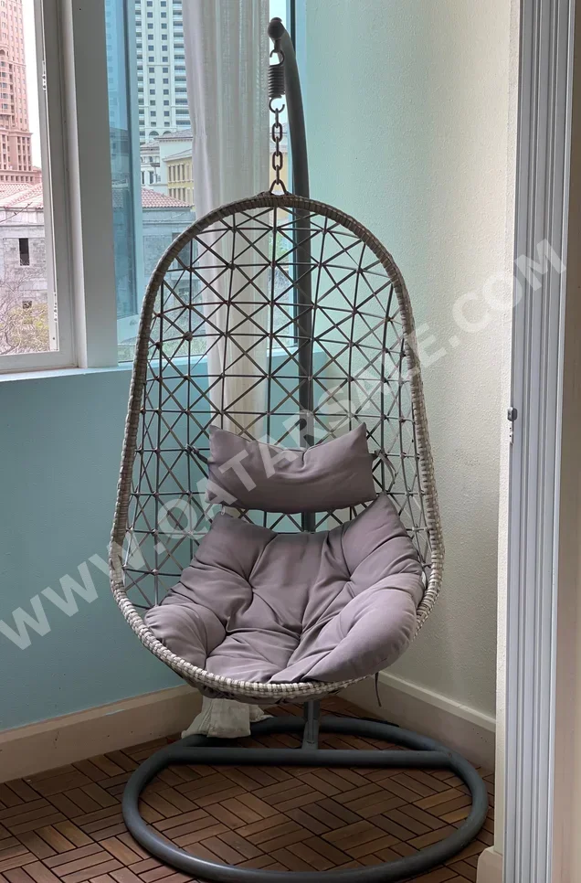 كراسي متأرجحة رمادي