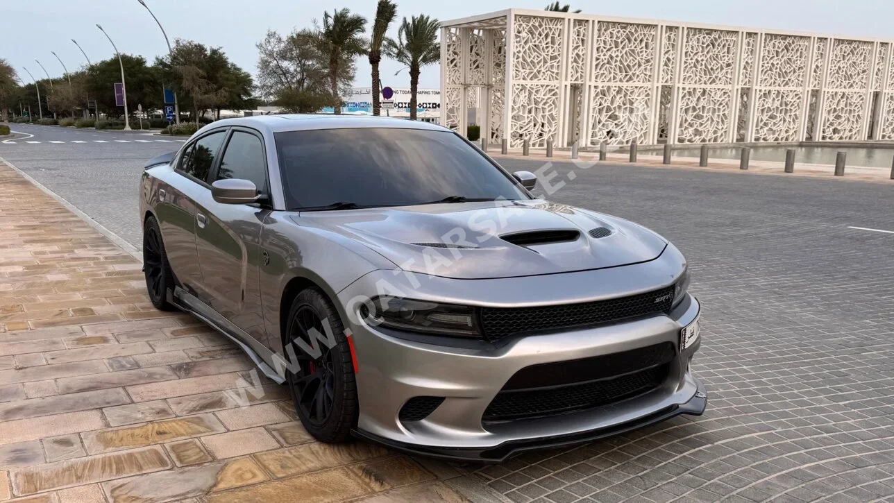دودج  تشارجر  هلكت  2016  اوتوماتيك  110,000 كم  8 سلندر  دفع خلفي  سيدان  فضي
