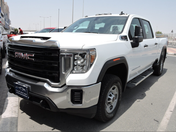 جي ام سي  سييرا  2500 HD  2023  اوتوماتيك  56,000 كم  8 سلندر  دفع رباعي  بيكب  أبيض