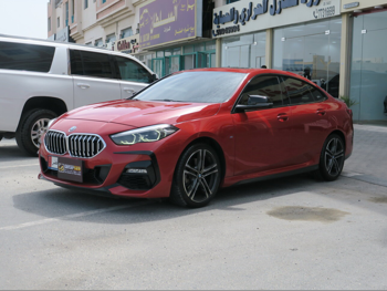 BMW  2-Series  218i  2021  Automatic  67,000 Km  4 Cylinder  Front Wheel Drive (FWD)  Sedan  Red