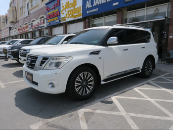 نيسان  باترول  ال اي  2013  اوتوماتيك  250,000 كم  8 سلندر  دفع رباعي  اس يو في  أبيض