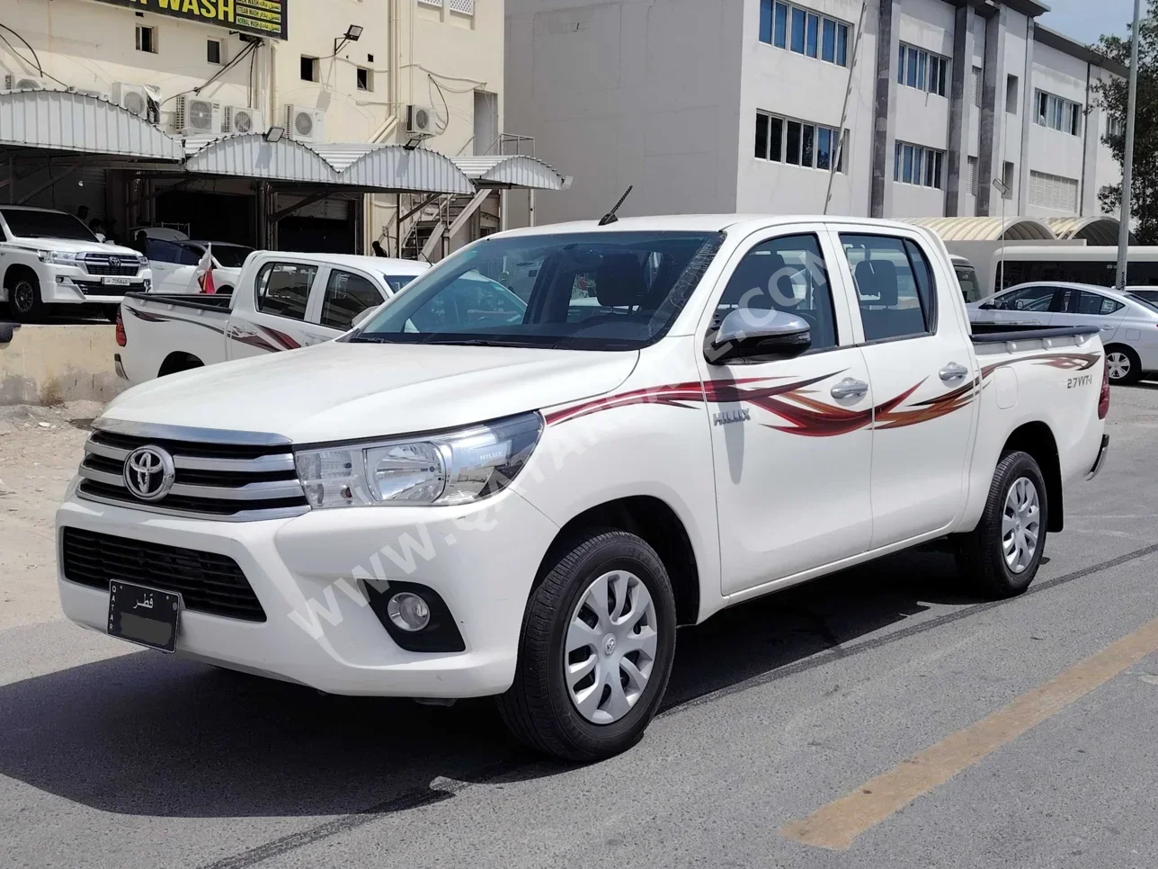 Toyota  Hilux  2022  Automatic  84,000 Km  4 Cylinder  Front Wheel Drive (FWD)  Pick Up  White