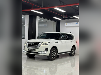 نيسان  باترول  أكس أي  2020  اوتوماتيك  209,000 كم  6 سلندر  دفع رباعي  اس يو في  أبيض