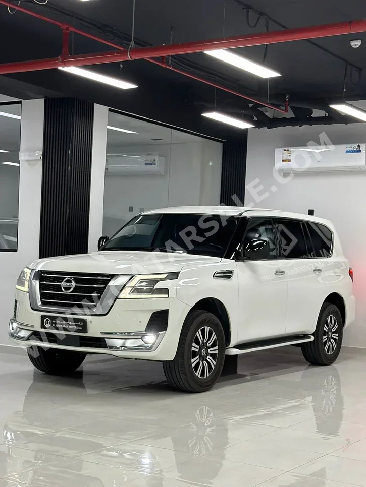 نيسان  باترول  أكس أي  2020  اوتوماتيك  209,000 كم  6 سلندر  دفع رباعي  اس يو في  أبيض