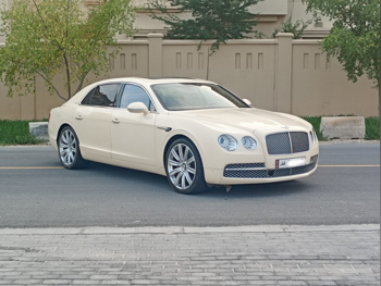 Bentley  Continental  Flying Spur  2014  Automatic  54,000 Km  12 Cylinder  All Wheel Drive (AWD)  Sedan  Beige