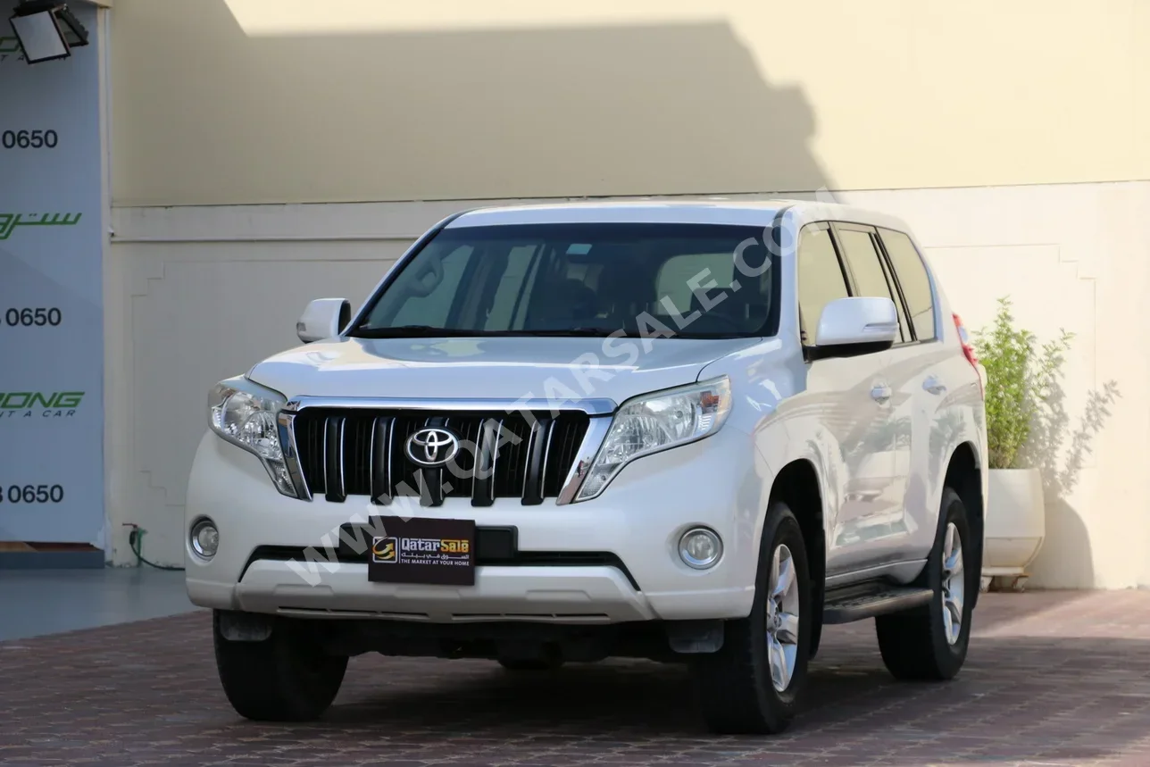 تويوتا  برادو  2015  اوتوماتيك  179,000 كم  6 سلندر  دفع رباعي  اس يو في  أبيض لؤلؤي