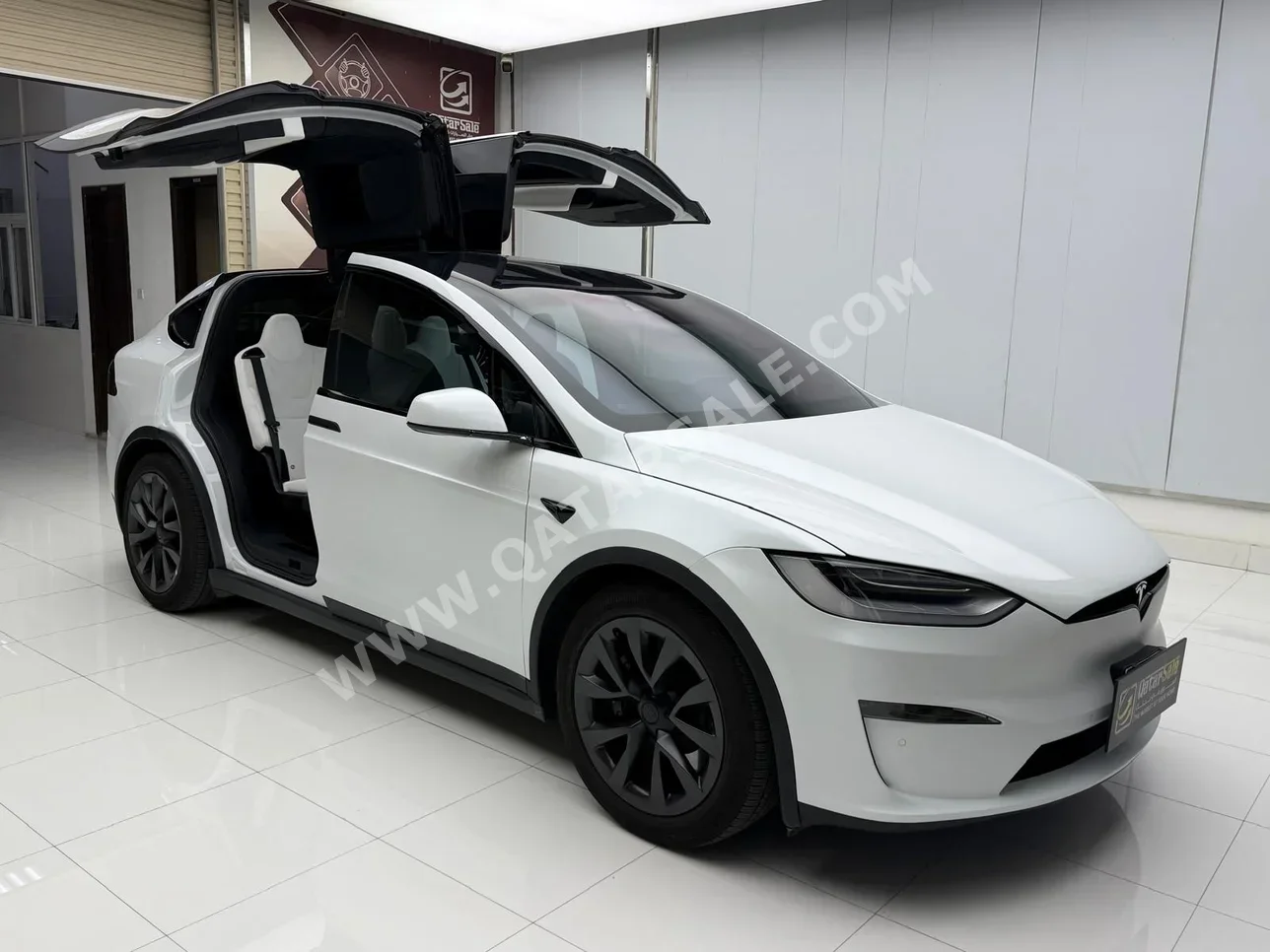 تسلا  مودل اكس  2023  اوتوماتيك  68,000 كم  0 سلندر  دفع كلي مستمر  اس يو في  أبيض  تحت الضمان