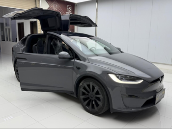 تسلا  مودل اكس  2023  اوتوماتيك  19,000 كم  0 سلندر  دفع كلي مستمر  اس يو في  رمادي  تحت الضمان