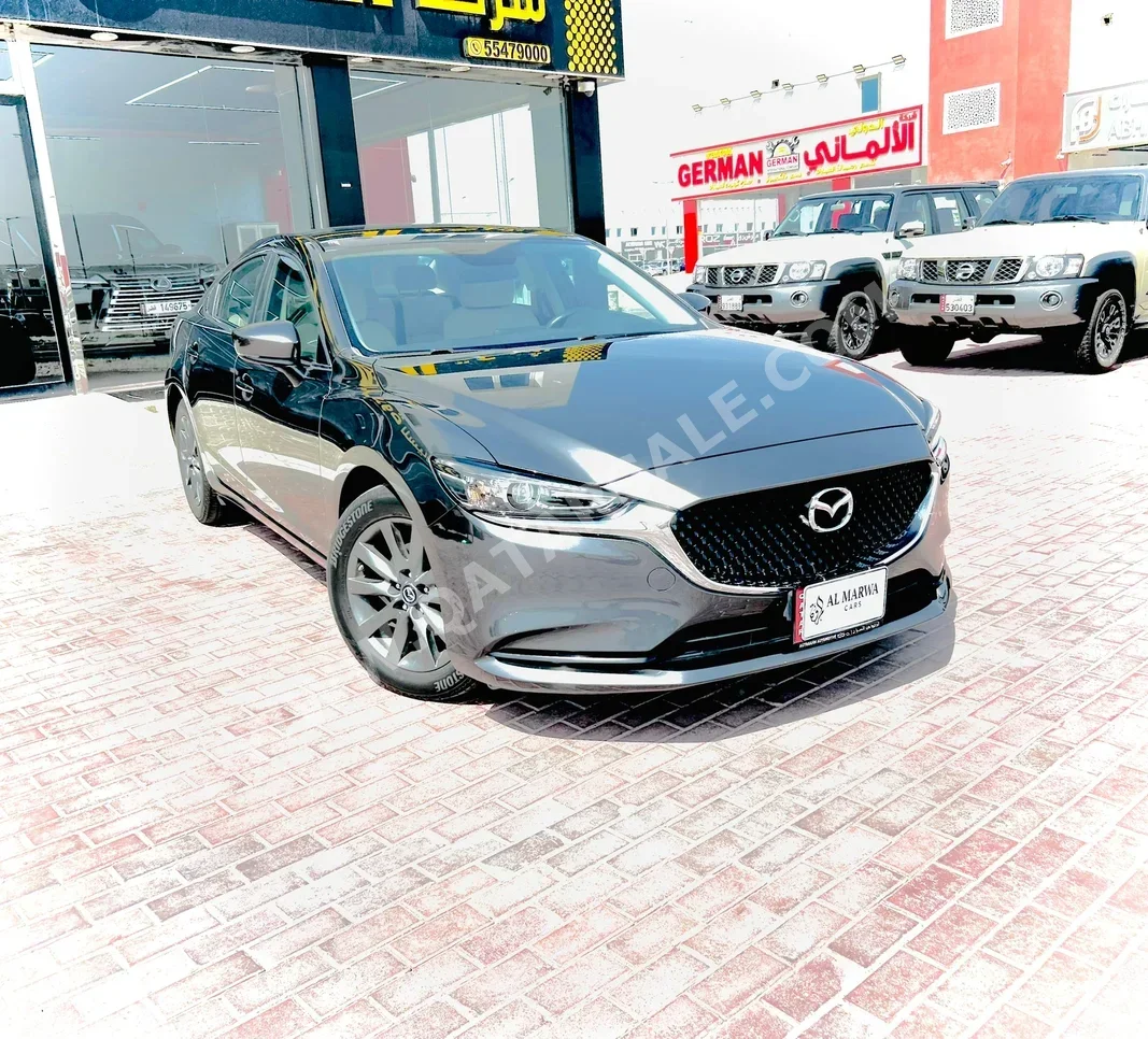 مازدا  مازدا 6  2024  اوتوماتيك  30,000 كم  4 سلندر  سحب امامي  سيدان  رمادي