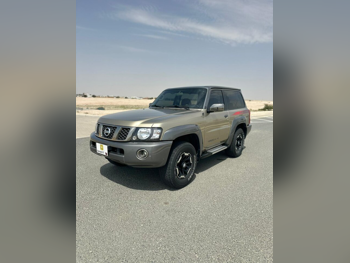 Nissan  Patrol  Super Safari  2021  Manual  116,376 Km  6 Cylinder  Four Wheel Drive (4WD)  SUV  Gold