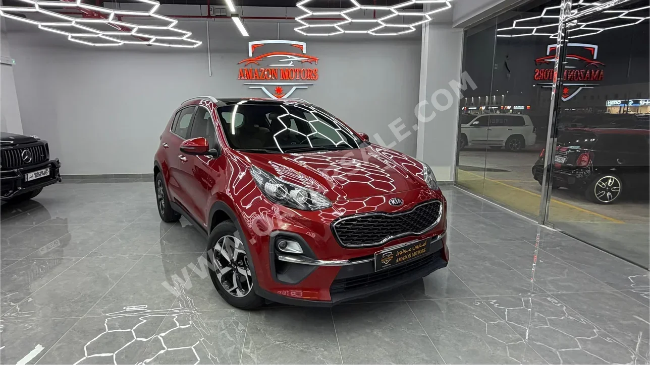 Kia  Sportage  2021  Automatic  87,000 Km  4 Cylinder  All Wheel Drive (AWD)  SUV  Maroon
