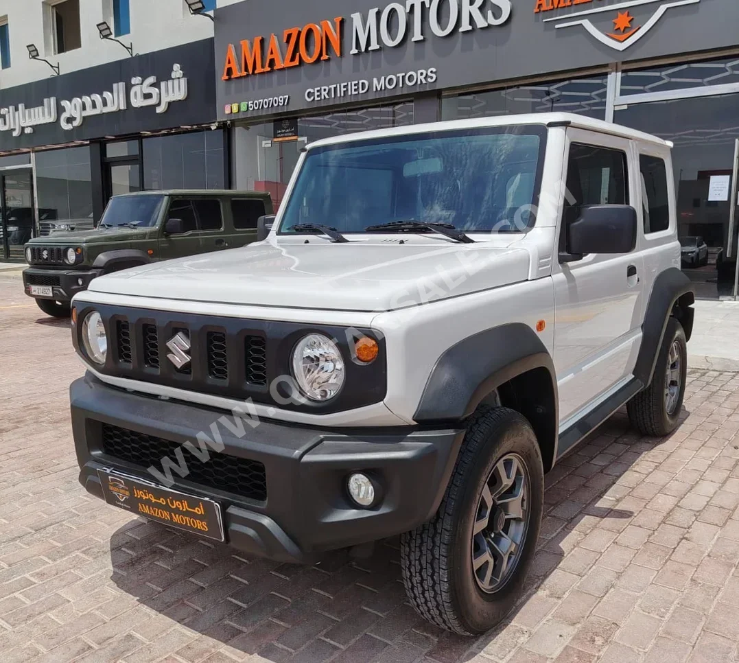 Suzuki  Jimny  2021  Automatic  90,000 Km  4 Cylinder  Four Wheel Drive (4WD)  SUV  White