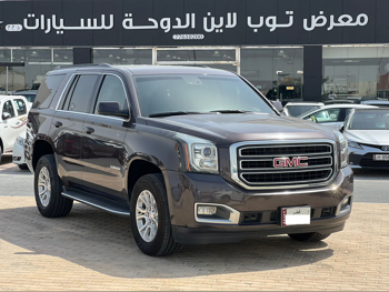 GMC  Yukon  SLE  2015  Automatic  130,000 Km  8 Cylinder  Rear Wheel Drive (RWD)  SUV  Brown