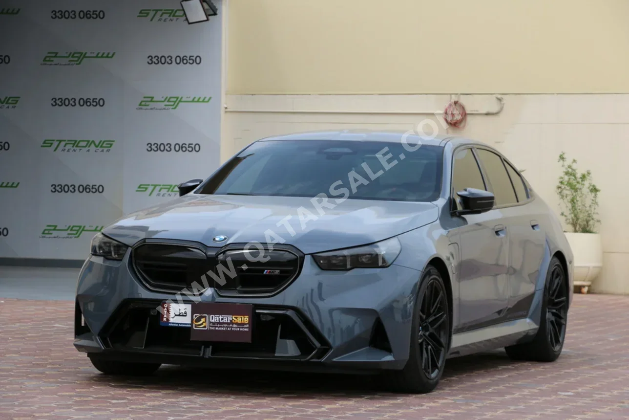 BMW  M-Series  5  2025  Automatic  12,000 Km  8 Cylinder  All Wheel Drive (AWD)  Sedan  Gray  With Warranty