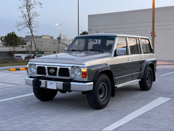Nissan  Patrol  Super Safari  1993  Automatic  110,000 Km  6 Cylinder  Four Wheel Drive (4WD)  SUV  Green and Gold