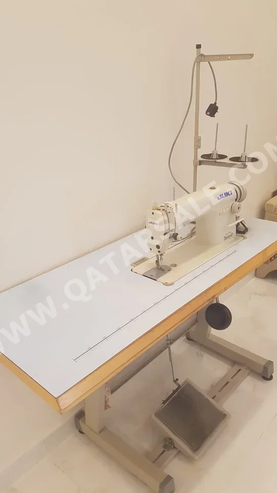 آلات وأدوات الخياطة