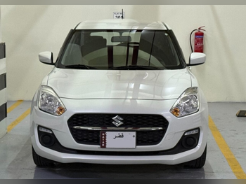 Suzuki  Swift  2023  Automatic  38,000 Km  4 Cylinder  Front Wheel Drive (FWD)  Hatchback  White