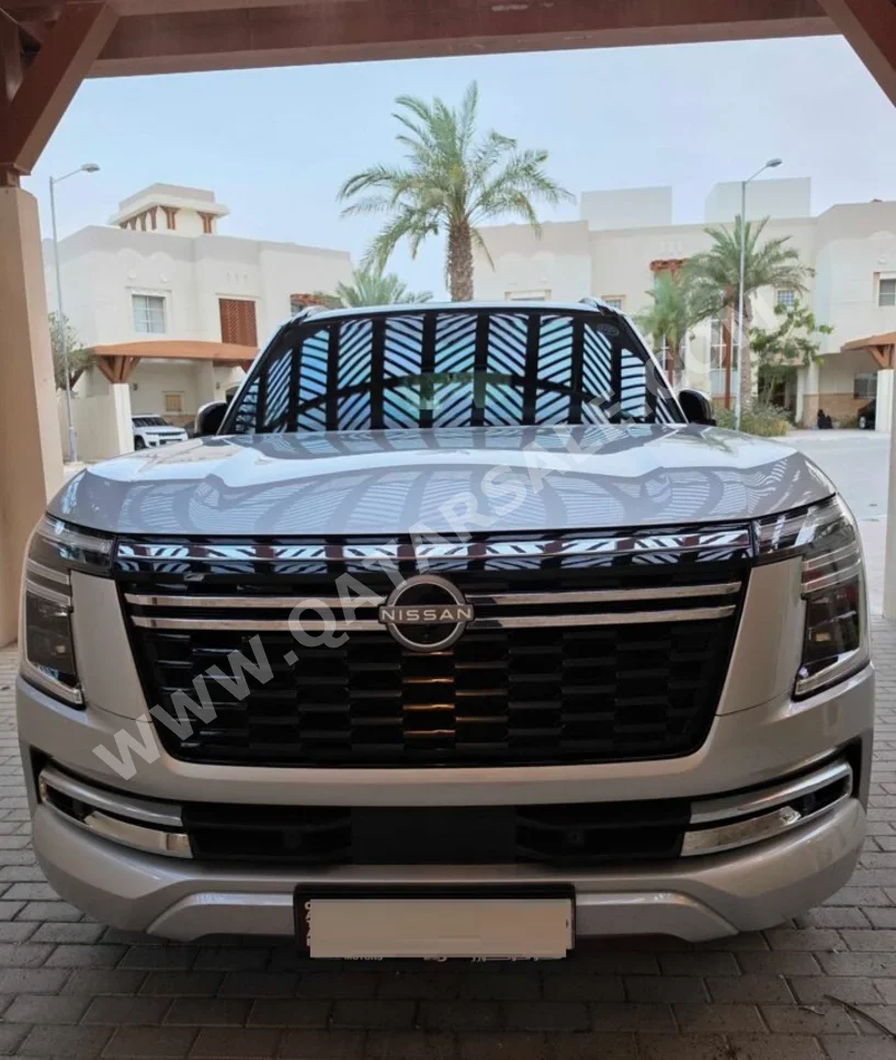 Nissan  Patrol  Platinum turbo  2025  Automatic  31,600 Km  6 Cylinder  Four Wheel Drive (4WD)  SUV  Black and Silver  With Warranty