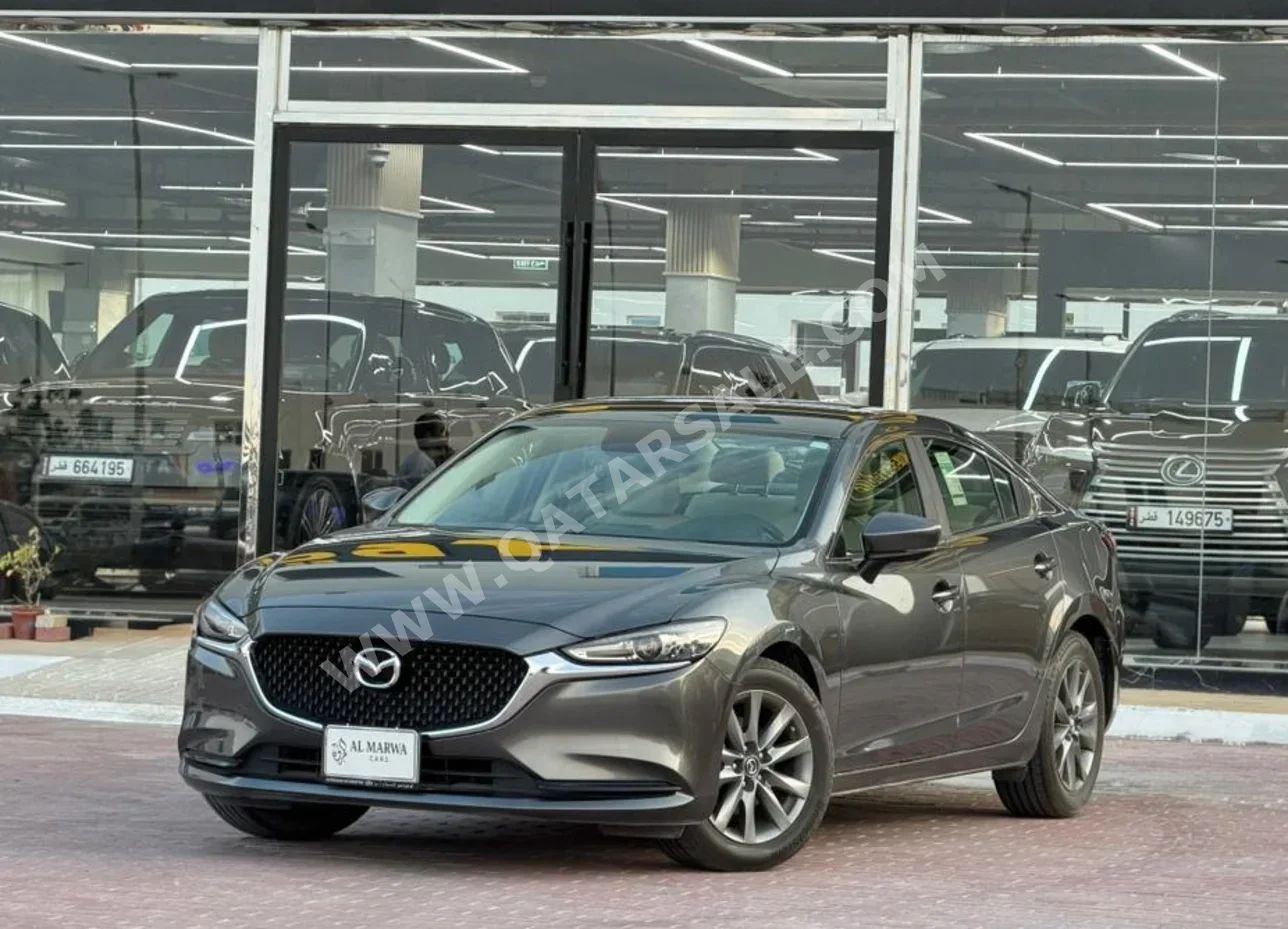 مازدا  مازدا 6  2024  اوتوماتيك  30,000 كم  4 سلندر  سحب امامي  سيدان  رمادي  تحت الضمان