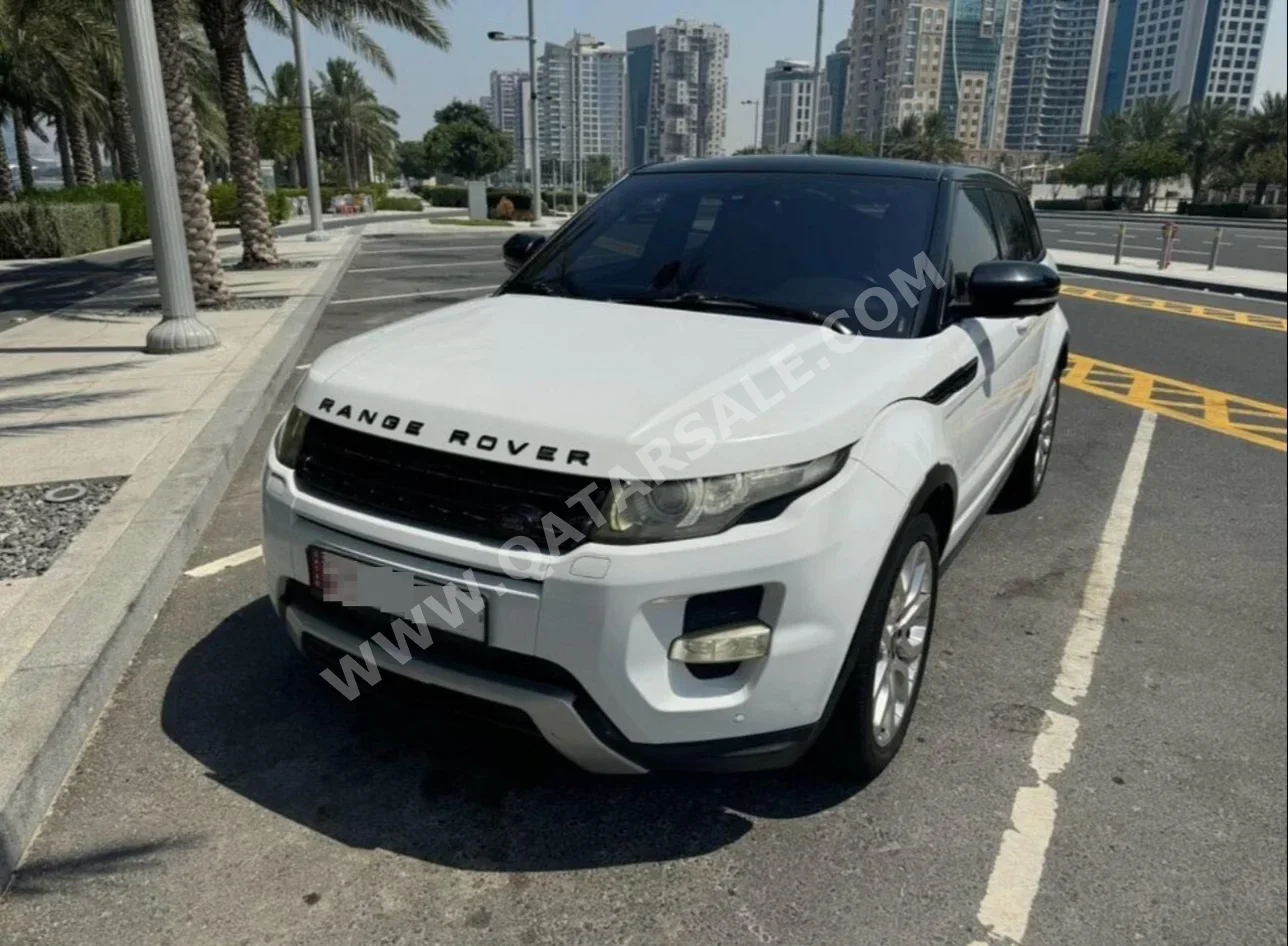 Land Rover  Evoque  Prestige  2013  Automatic  102,000 Km  4 Cylinder  Four Wheel Drive (4WD)  SUV  White and Black