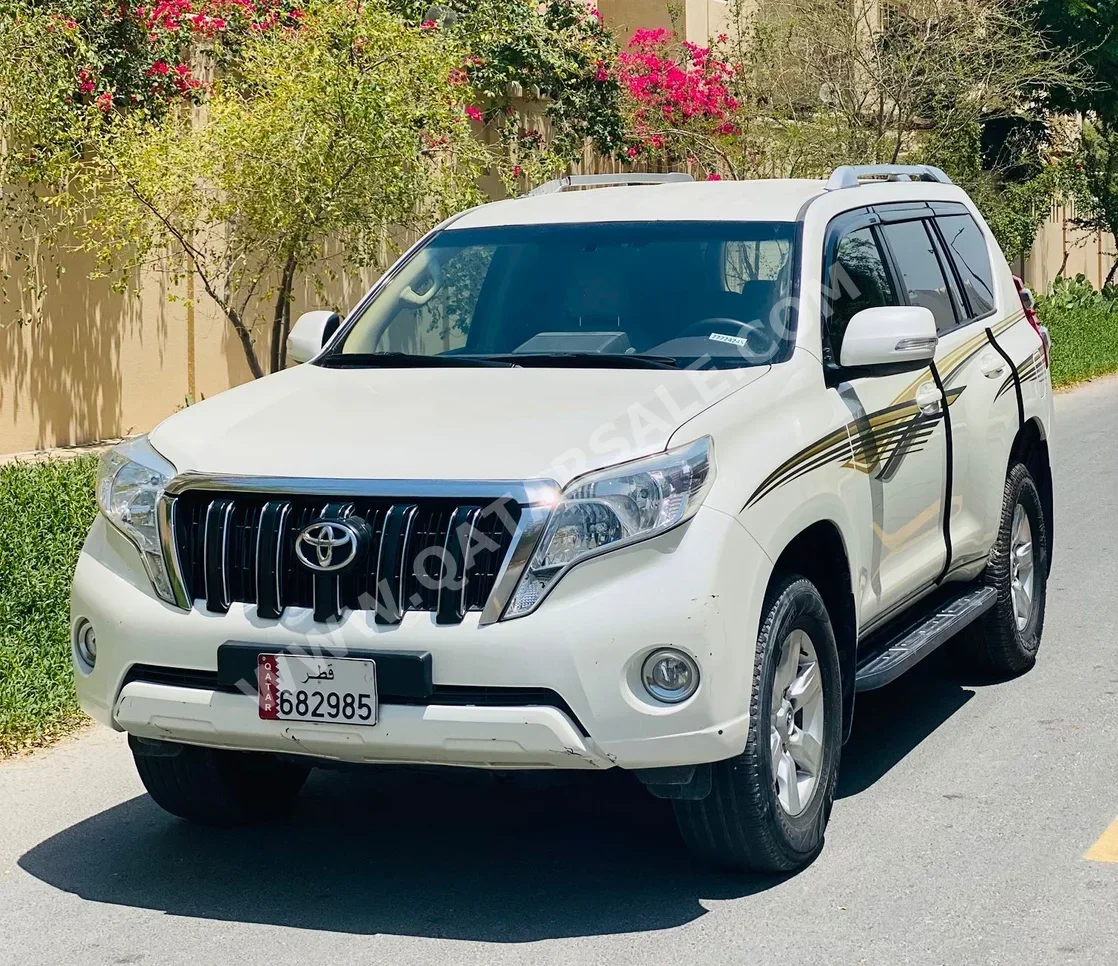 تويوتا  برادو  2016  اوتوماتيك  195,000 كم  4 سلندر  دفع رباعي  اس يو في  أبيض