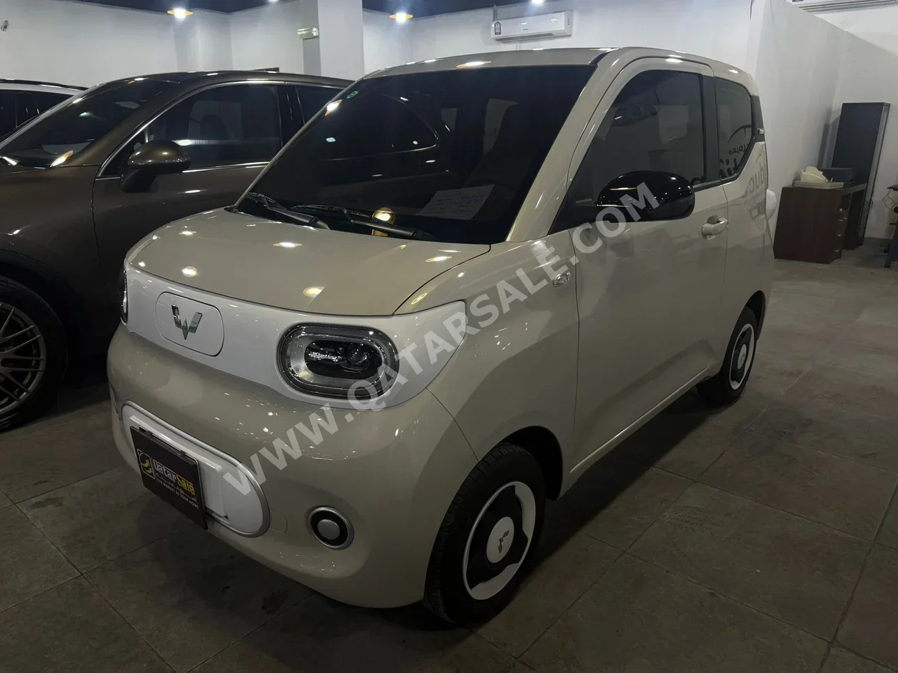 وولينغ  ميني اي في  2026  اوتوماتيك  1,000 كم  0 سلندر  دفع خلفي  هاتشباك  بيج  تحت الضمان