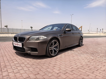 BMW  M-Series  M5 Performance  2013  Automatic  120,000 Km  8 Cylinder  Rear Wheel Drive (RWD)  Sedan  Brown