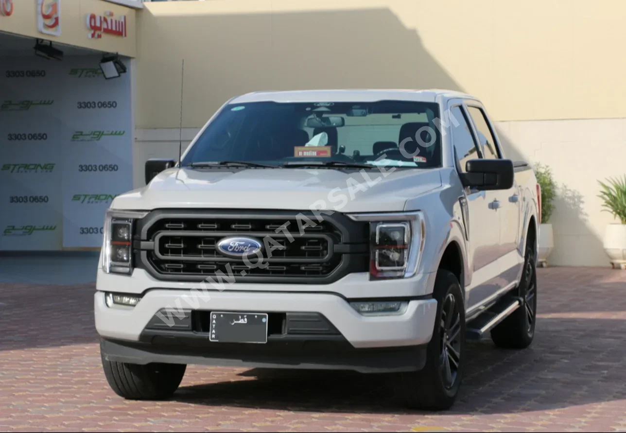 فورد  أف  150  2023  اوتوماتيك  55,000 كم  8 سلندر  دفع رباعي  بيكب  رمادي