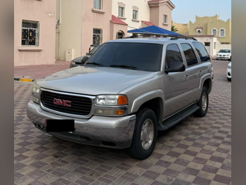 GMC  Yukon  2006  Automatic  318,000 Km  8 Cylinder  Four Wheel Drive (4WD)  SUV  Gold