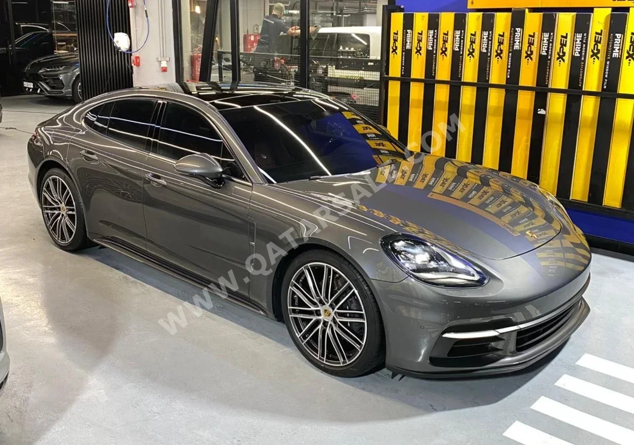 Porsche  Panamera  2018  Automatic  75,000 Km  8 Cylinder  All Wheel Drive (AWD)  Sedan  Gray  With Warranty