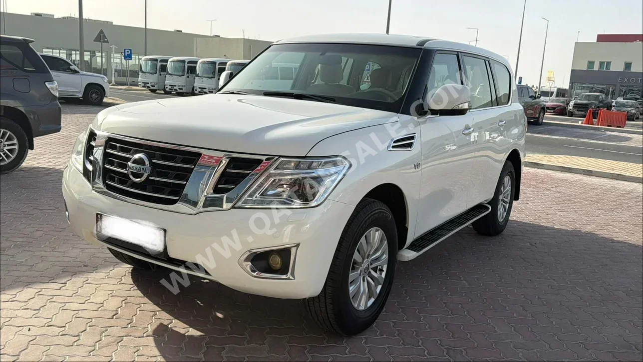 Nissan  Patrol  SE  2015  Automatic  250,000 Km  8 Cylinder  Four Wheel Drive (4WD)  SUV  White