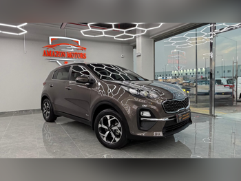 Kia  Sportage  2021  Automatic  136,000 Km  4 Cylinder  All Wheel Drive (AWD)  SUV  Gray