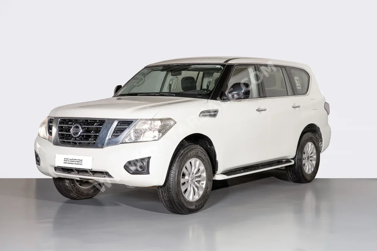 Nissan  Patrol  XE  2019  Automatic  63,240 Km  6 Cylinder  Four Wheel Drive (4WD)  SUV  White