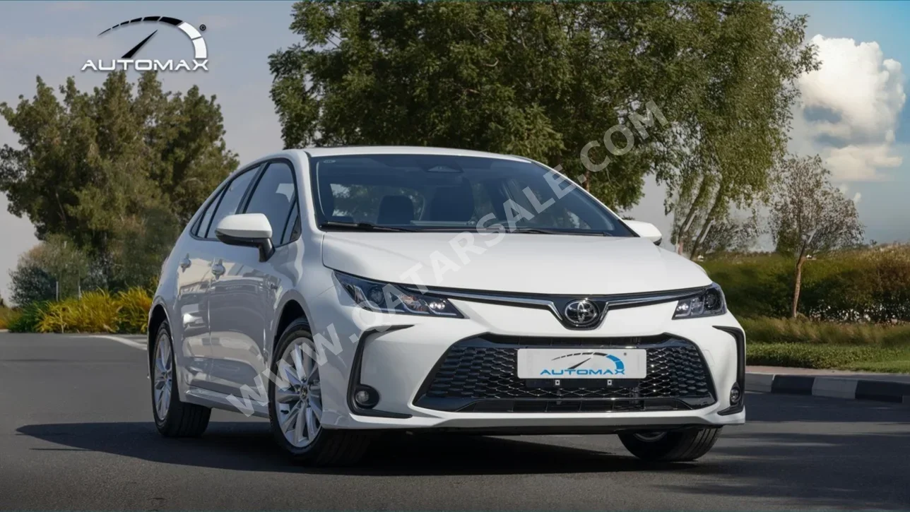 تويوتا  كورولا  هايبرد  2025  اوتوماتيك  0 كم  4 سلندر  سحب امامي  سيدان  أبيض  تحت الضمان