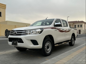Toyota  Hilux  2022  Manual  67,000 Km  4 Cylinder  Four Wheel Drive (4WD)  Pick Up  White  With Warranty