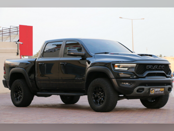 دودج  رام  تي أر إكس  2023  اوتوماتيك  57,000 كم  8 سلندر  دفع رباعي  بيكب  أسود  تحت الضمان