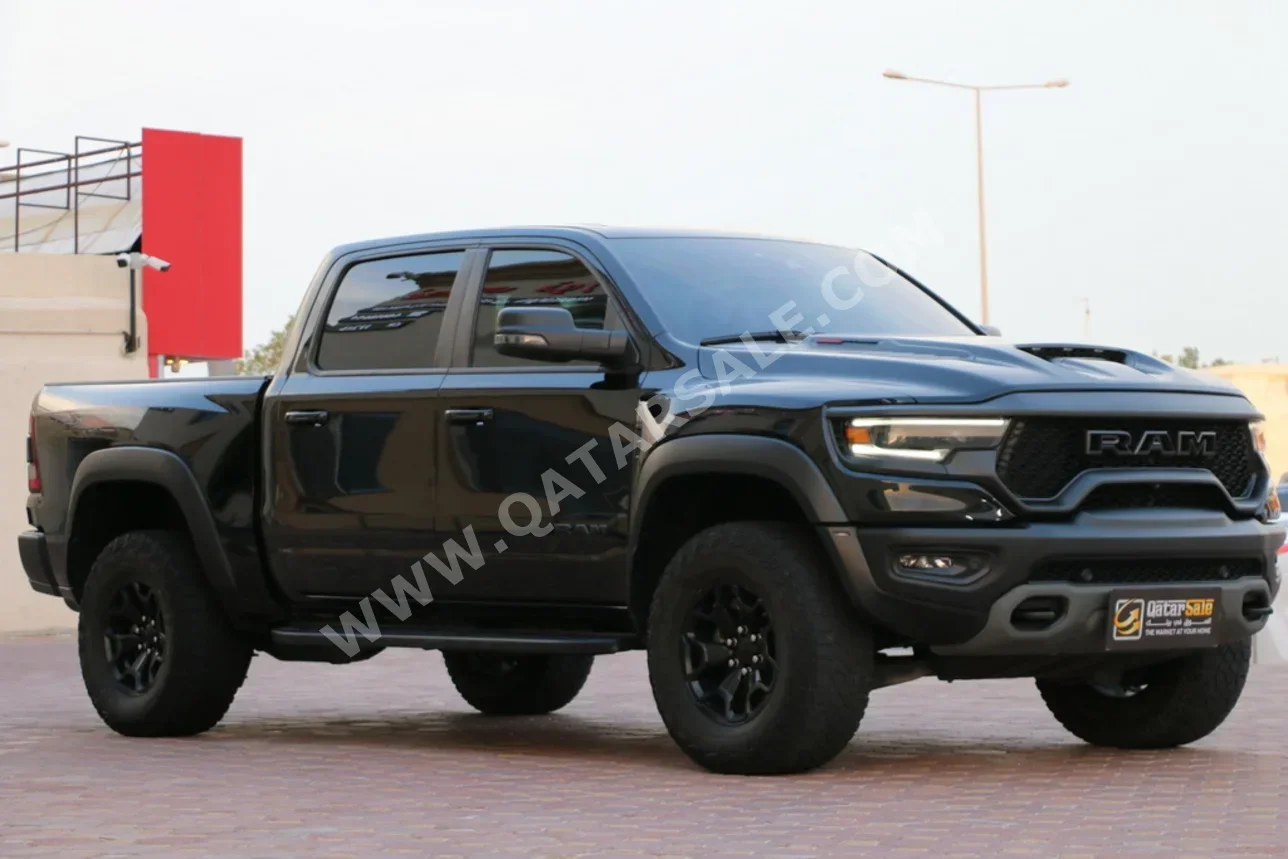 دودج  رام  تي أر إكس  2023  اوتوماتيك  57,000 كم  8 سلندر  دفع رباعي  بيكب  أسود  تحت الضمان