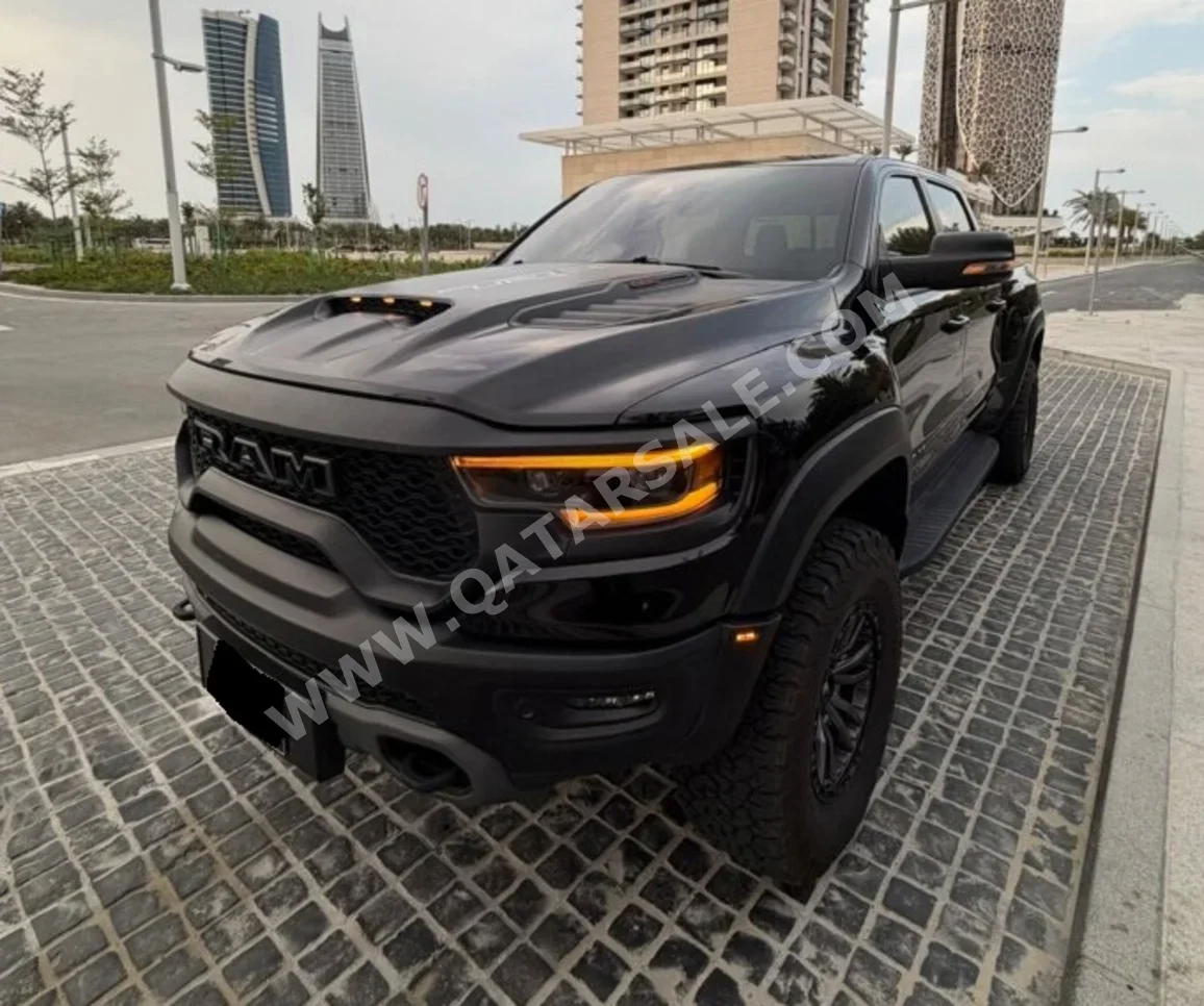 دودج  رام  تي أر إكس  2023  اوتوماتيك  32,000 كم  8 سلندر  دفع رباعي  بيكب  أسود  تحت الضمان