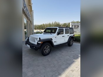 Jeep  Wrangler  Sport  2022  Automatic  28,000 Km  6 Cylinder  Four Wheel Drive (4WD)  SUV  White  With Warranty