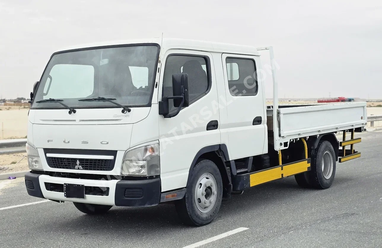 Mitsubishi  Fuso Canter  2021  Manual  190,000 Km  4 Cylinder  Rear Wheel Drive (RWD)  Pick Up  White
