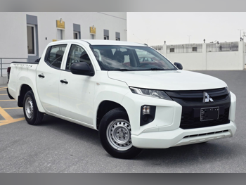 Mitsubishi  L 200  2021  Manual  200,000 Km  4 Cylinder  Rear Wheel Drive (RWD)  Pick Up  White