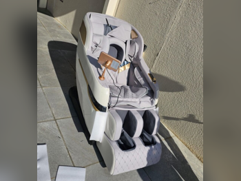 كرسي التدليك اللون البيج