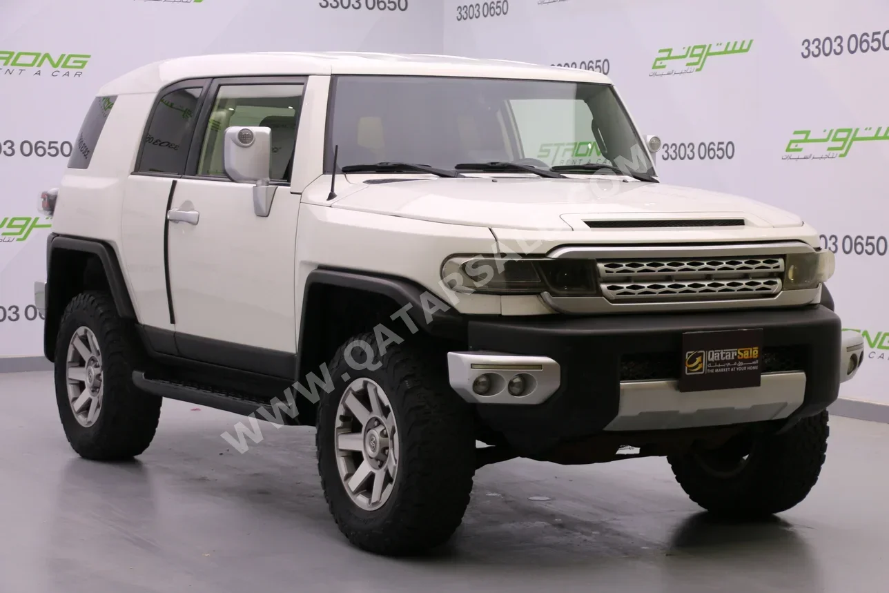Toyota  FJ Cruiser  TRD  2014  Automatic  249,000 Km  6 Cylinder  Four Wheel Drive (4WD)  SUV  White
